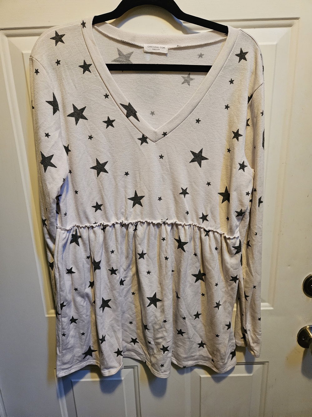 Chic Soul Cream V-Neck Peplum Tunic with Black Star Print